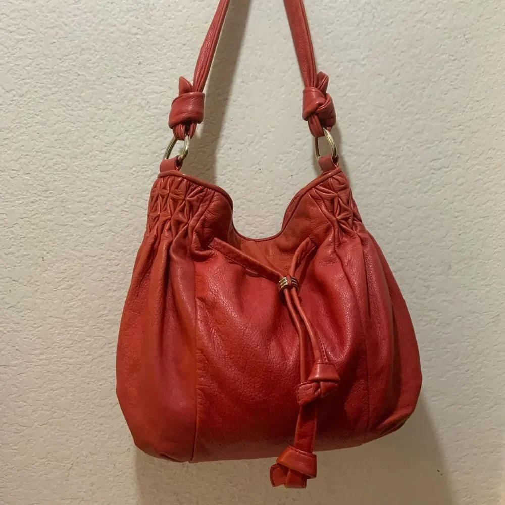 Elliott Lucca drawstring genuine leather bag open top